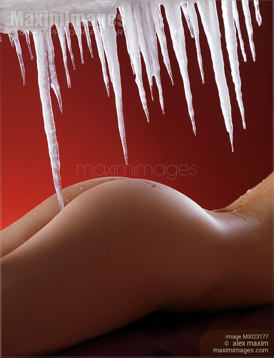Sexy Naked Woman Under Melting Icicles Stock photo of Sexy Naked Woman Under Melting Icicles Buy commercial use license at MaximImages