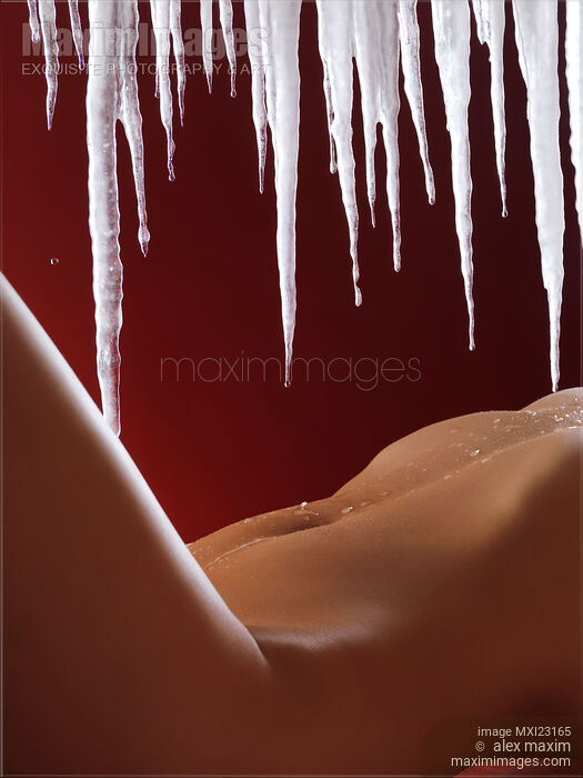 Sexy Nude Woman Body Under Melting Icicles Stock photo of Sexy Nude Woman Body Under Melting Icicles Buy commercial use license at MaximImages
