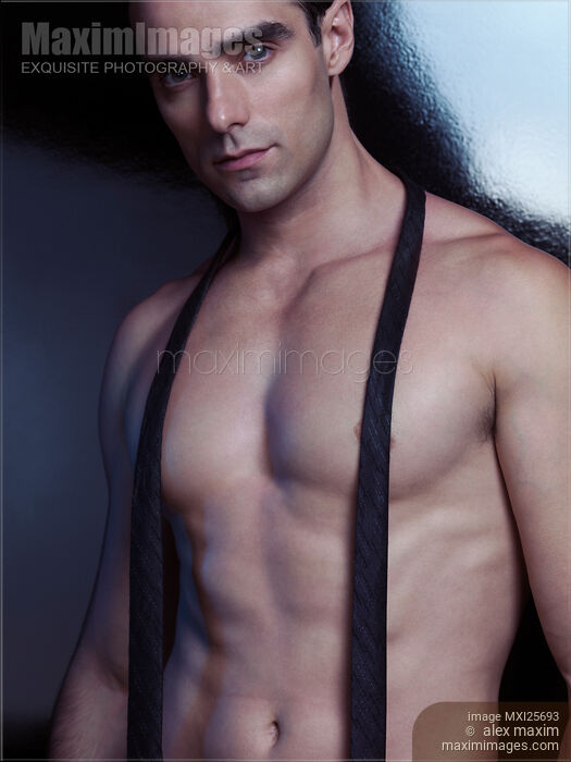 Sexy young man with necktie Stock photo of Sexy young man with necktie Buy commercial use license at MaximImages