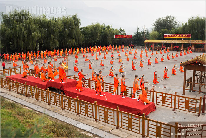 Shaolin Kung Fu students practicing staff in China Stock photo of Shaolin Kung Fu students practicing staff in China Buy commercial use license at MaximImages
