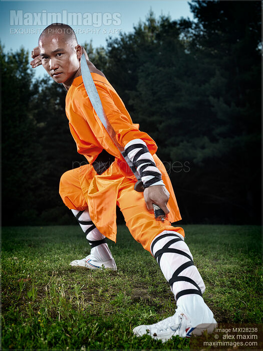 Photo of Shaolin warrior monk with a broad sword