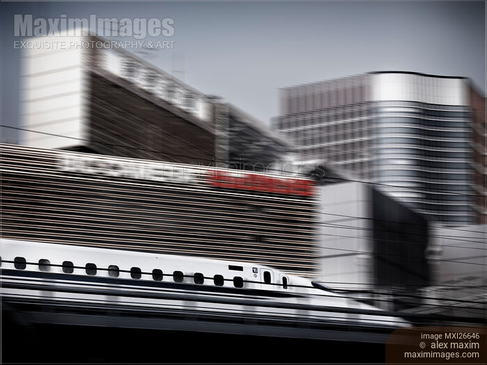 Stock photo of Shinkansen high speed bullet train with Tokyo in background Buy commercial use license at MaximImages
