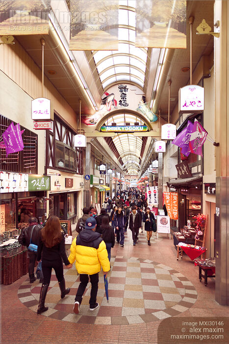 Stock photo of Shinkyogoku covered street shopping arcade busy with people Kyoto Japan Buy commercial use license at MaximImages