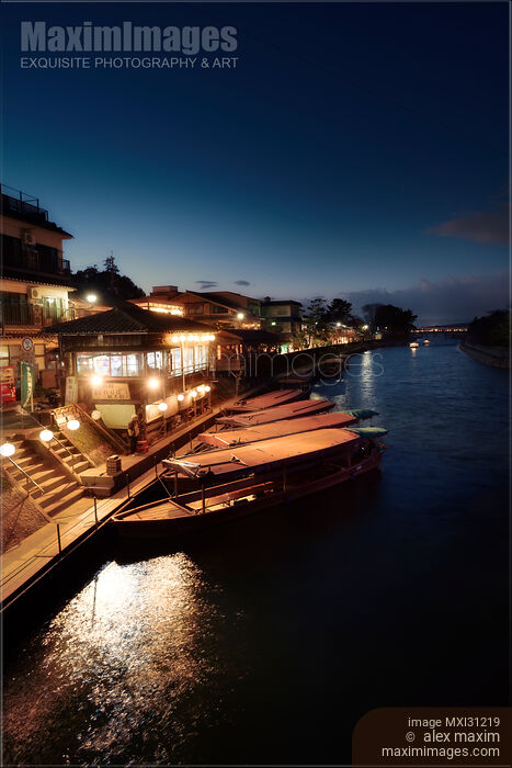 Sightseeing pleasure cruise boats at night on Uji River in Japan Stock photo of Sightseeing pleasure cruise boats at night on Uji River in Japan Buy commercial use license at MaximImages