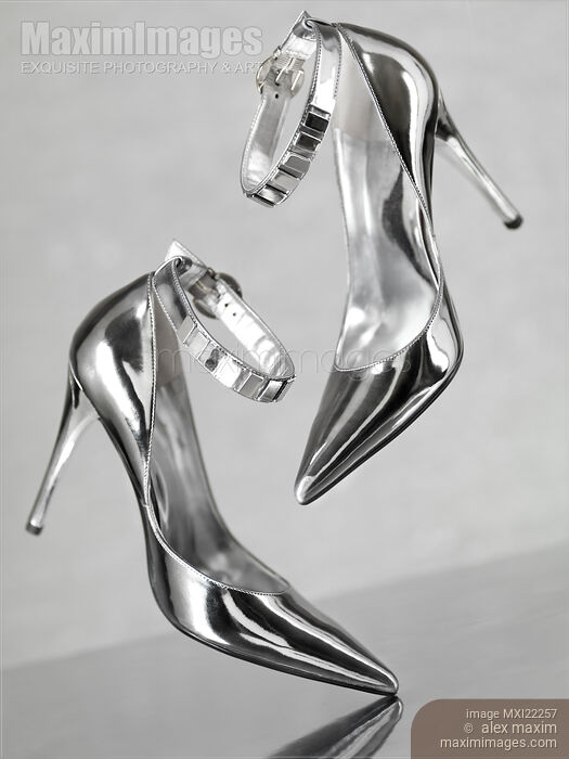 Stock photo of Silver Stiletto Shoes Buy commercial use license at MaximImages