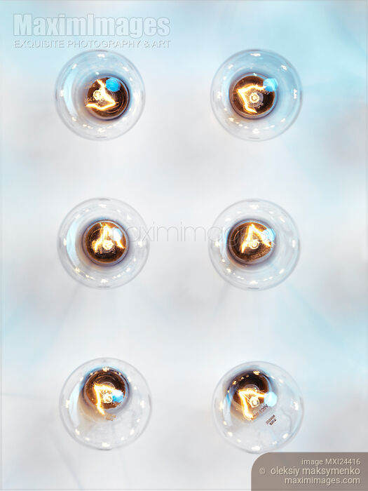 Six lit Incandescent light bulbs Stock photo of Six lit Incandescent light bulbs Buy commercial use license at MaximImages