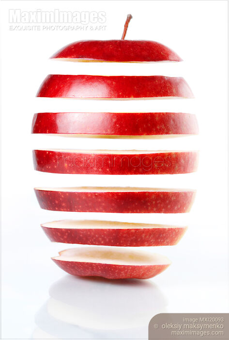 Stock photo of Slices of red apple Buy commercial use license at MaximImages