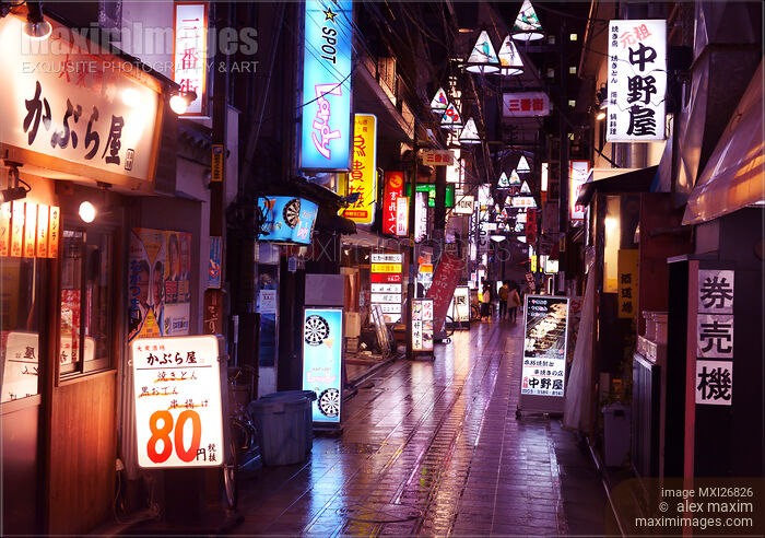 Stock photo of Small city street with restaurants in Japan at night Buy commercial use license at MaximImages