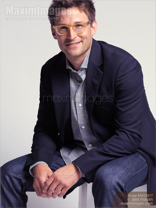 Smiling Fashionably Dressed Man Stock photo of Smiling Fashionably Dressed Man Buy commercial use license at MaximImages