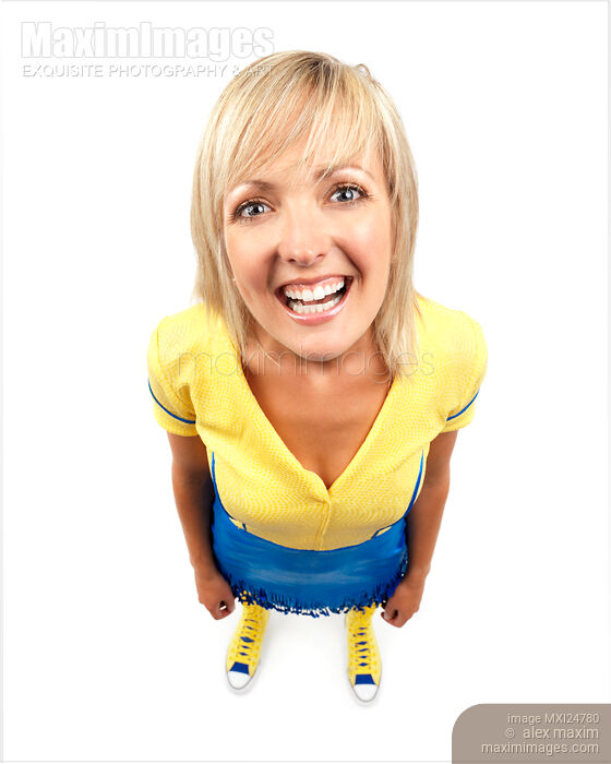 Stock photo of Smiling young woman humorous photo Buy commercial use license at MaximImages