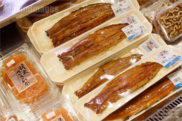 Stock photo of Smoked eel at supermarket Buy commercial use license at MaximImages