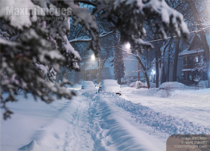 Stock photo of Snow covered city street Buy commercial use license at MaximImages