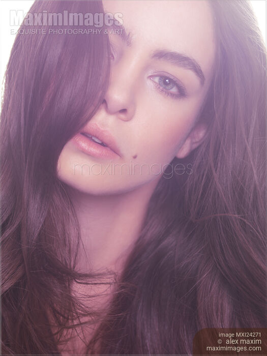 Soft light beauty portrait of a young woman Stock photo of Soft light beauty portrait of a young woman Buy commercial use license at MaximImages