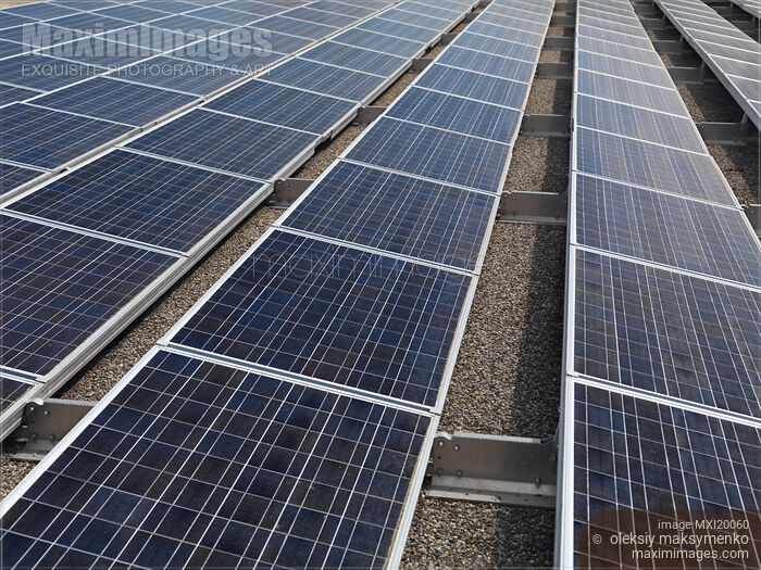 Stock photo of Solar Panels on a Roof Buy commercial use license at MaximImages