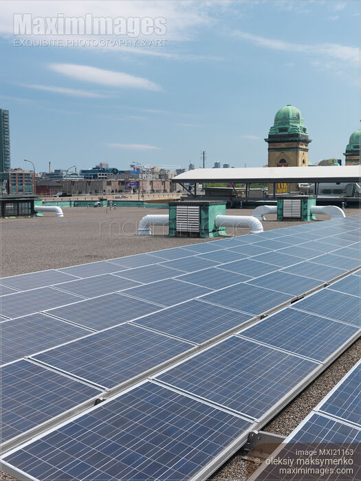 Stock photo of Solar Panels on a Roof Buy commercial use license at MaximImages