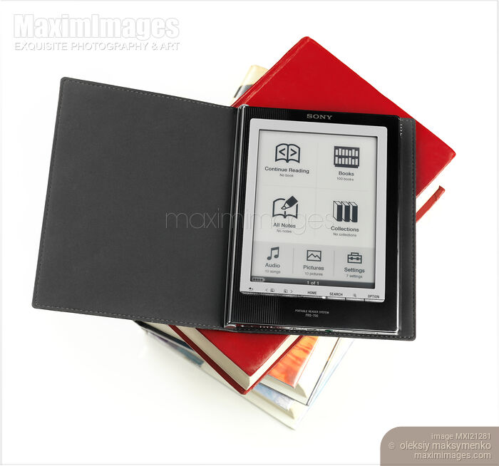 Stock photo of Sony Reader on a Pile of Books Buy commercial use license at MaximImages