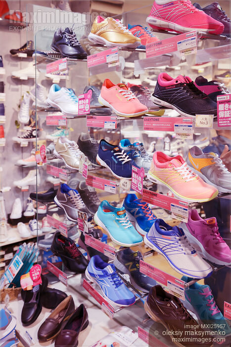 Stock photo of Sports shoes in store Buy commercial use license at MaximImages
