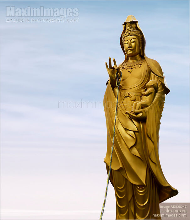 Statues of female Buddha Guanyin the Goddess of Compassion with a baby in her hands Stock photo of Statues of female Buddha Guanyin the Goddess of Compassion with a baby in her hands Buy commercial use license at MaximImages