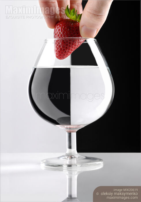 Stock photo of Strawberry in a Glass Buy commercial use license at MaximImages