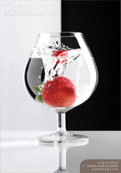 Stock photo of Strawberry in a Glass Buy commercial use license at MaximImages