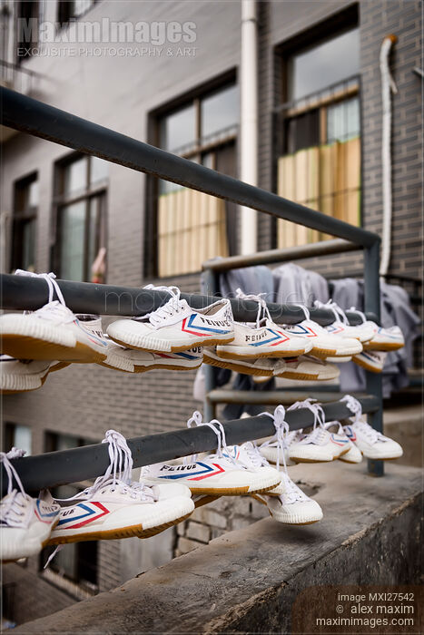 Students Feiyue shoes drying at Shaolin dormitory in China Stock photo of Students Feiyue shoes drying at Shaolin dormitory in China Buy commercial use license at MaximImages