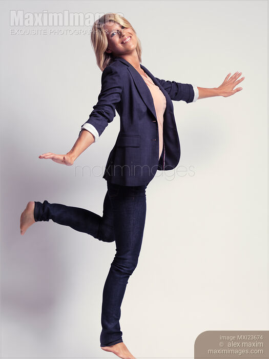 Stylish Carefree Business Woman Stock photo of Stylish Carefree Business Woman Buy commercial use license at MaximImages