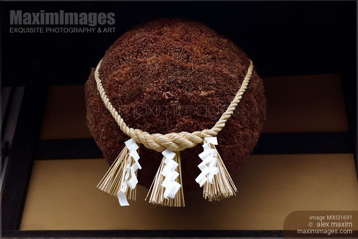 Stock photo of Sugidama cedar ball with Shimenawa Shinto rope tied around it at a sake brewery in Takayama Japan Buy commercial use license at MaximImages