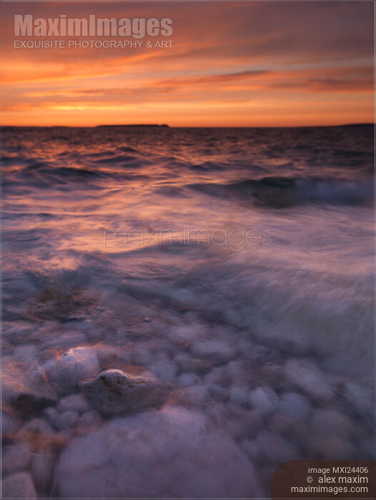 Sunset over Georgian Bay stormy waters Stock photo of Sunset over Georgian Bay stormy waters Buy commercial use license at MaximImages