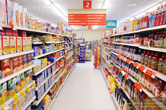 Stock photo of Supermarket aisle with grocery products on the shelves Buy commercial use license at MaximImages