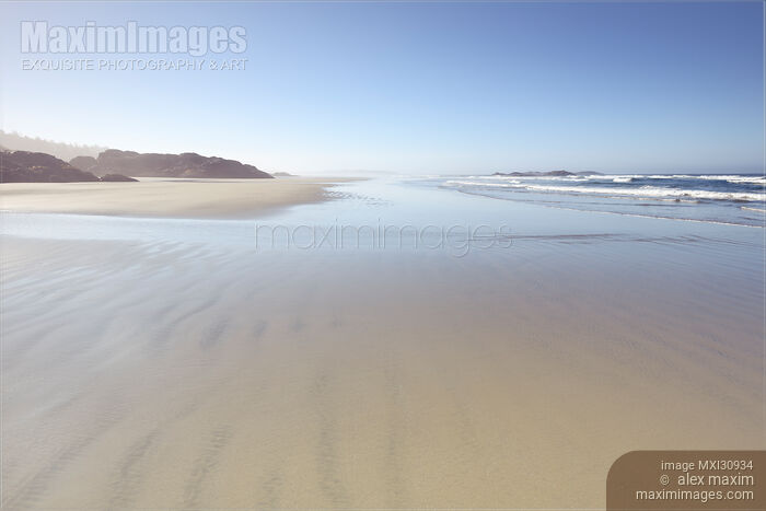 Surreal scenery of the sandy ocean shore at Pacific Rim National Park Tofino Stock photo of Surreal scenery of the sandy ocean shore at Pacific Rim National Park Tofino Buy commercial use license at MaximImages