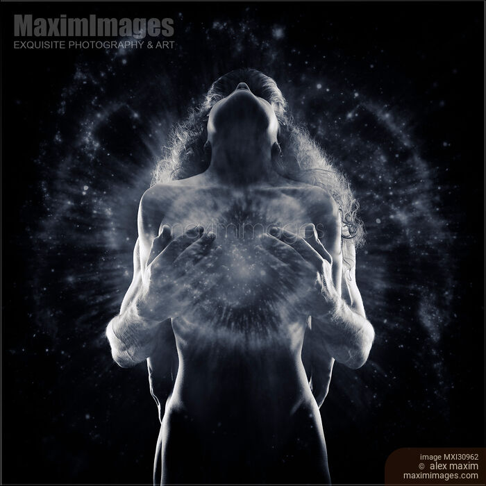 Tantra and sacred sensuality spiritual concept of a couple making love with Tantric energy glow Stock photo of Tantra and sacred sensuality spiritual concept of a couple making love with Tantric energy glow Buy commercial use license at MaximImages