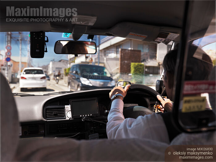Stock photo of Taxi cab driver Kawaguchiko Japan Buy commercial use license at MaximImages