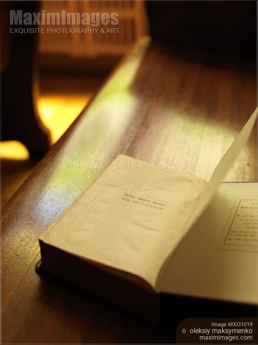 Stock photo of The Pentateuch on a bench in a Jewish Synagogue Buy commercial use license at MaximImages