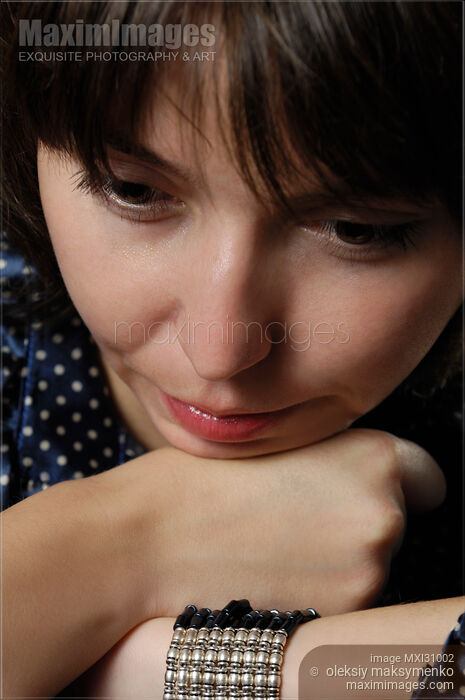 Stock photo of Thoughtful Woman Emotional Portrait Buy commercial use license at MaximImages