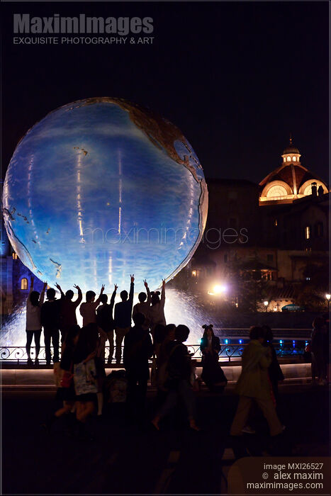 Stock photo of Tokyo Disneysea theme park Earth globe fountain at night Buy commercial use license at MaximImages
