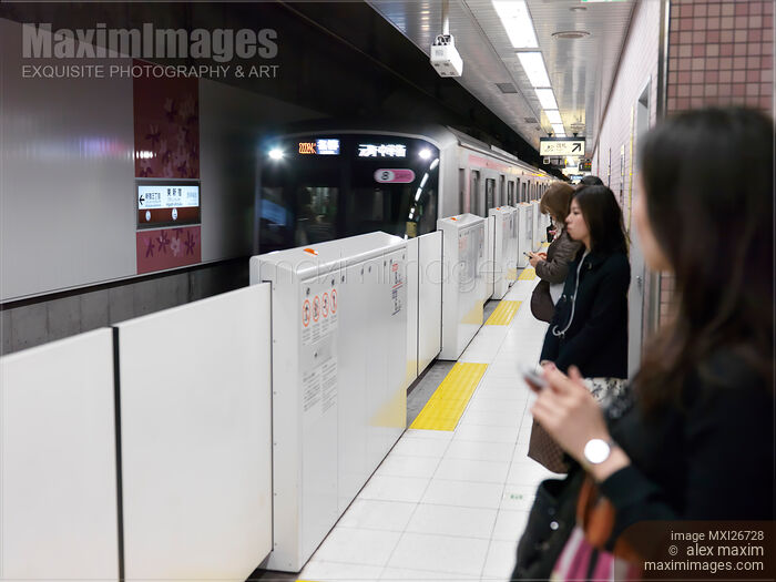 Tokyo Metro subway train arriving to platform Stock photo of Tokyo Metro subway train arriving to platform Buy commercial use license at MaximImages