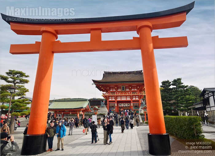 Stock photo of Torii in front of the Main gate of Fushimi Inari shrine in Kyoto Japan Buy commercial use license at MaximImages