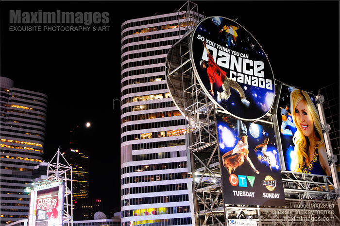 Stock photo of Toronto Dundas and Yonge at Night Buy commercial use license at MaximImages