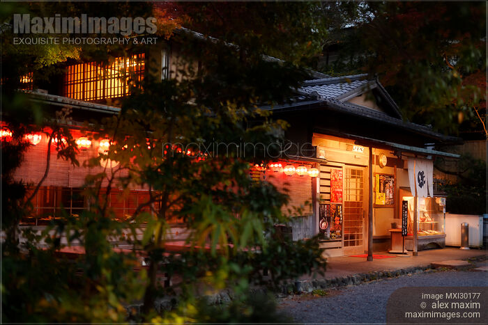 Stock photo of Traditional Japanese restaurant with lit lanterns in Kyoto Japan Buy commercial use license at MaximImages