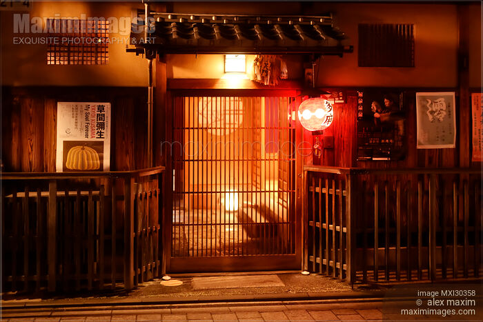 Stock photo of Traditional Japanese tea house Tama with a red lantern lit up at night Hanamikoji Dori Gion Kyoto Buy commercial use license at MaximImages