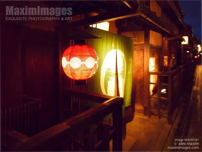Traditional teahouse red lantern by the entrance door lit up at night in Gion Kyoto Stock photo of Traditional teahouse red lantern by the entrance door lit up at night in Gion Kyoto Buy commercial use license at MaximImages
