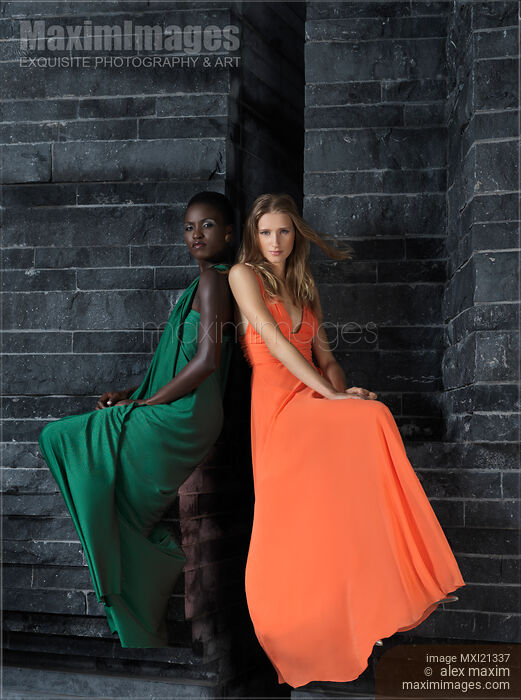 Two Beautiful Women in Elegant Dresses Stock photo of Two Beautiful Women in Elegant Dresses Buy commercial use license at MaximImages
