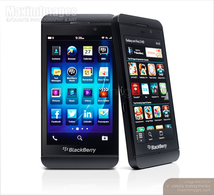 Two Blackberry Z10 smartphones on white Stock photo of Two Blackberry Z10 smartphones on white Buy commercial use license at MaximImages