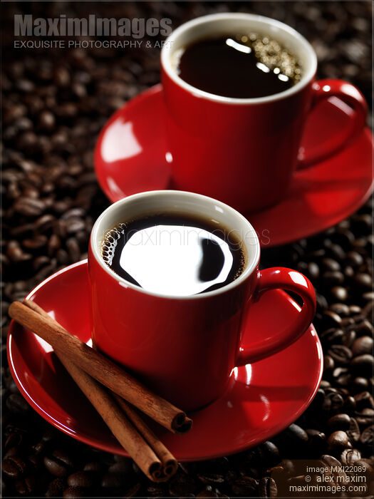 Stock photo of Two Cups of Coffe on Coffee Beans Buy commercial use license at MaximImages