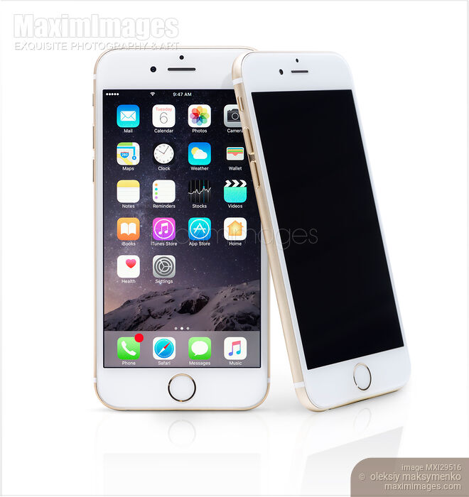 Two Gold Apple iPhones 6 6s isolated on white Stock photo of Two Gold Apple iPhones 6 6s isolated on white Buy commercial use license at MaximImages