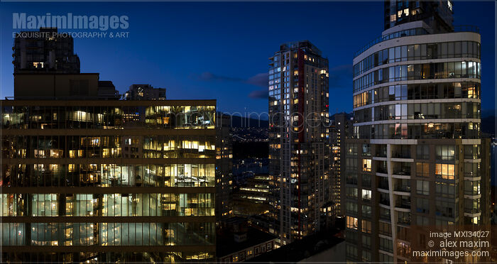 Stock photo of Vancouver downtown night cityscape scenery of high-rise office buildings and condo towers Buy commercial use license at MaximImages