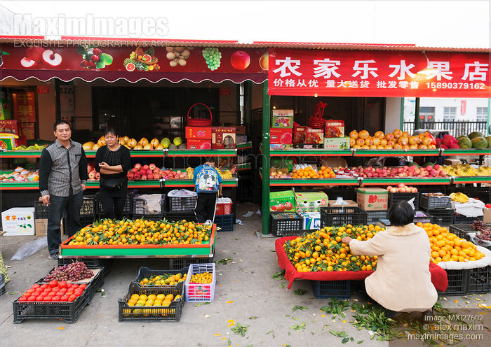 Vendors at food market in Zhengzhou China Stock photo of Vendors at food market in Zhengzhou China Buy commercial use license at MaximImages