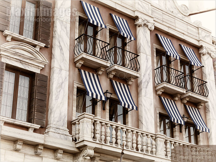 Venetian house windows with canopies Stock photo of Venetian house windows with canopies Buy commercial use license at MaximImages