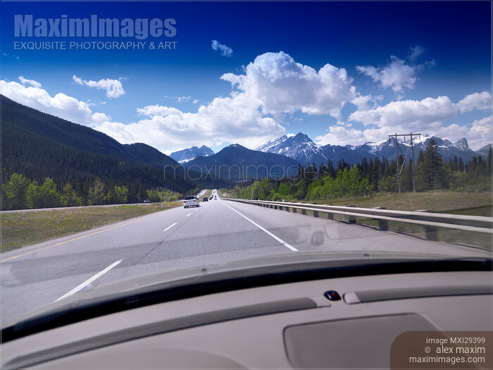 View of the Rocky Mountains from a car on Trans-Canada Highway Stock photo of View of the Rocky Mountains from a car on Trans-Canada Highway Buy commercial use license at MaximImages