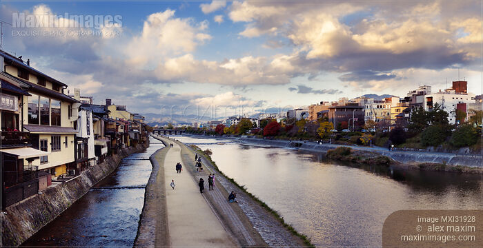 Walkway along Kamo-gawa Kamo River in Kyoto in a panoramic sunset scenery Stock photo of Walkway along Kamo-gawa Kamo River in Kyoto in a panoramic sunset scenery Buy commercial use license at MaximImages